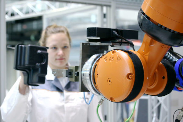 Interactive control to guide industrial robots