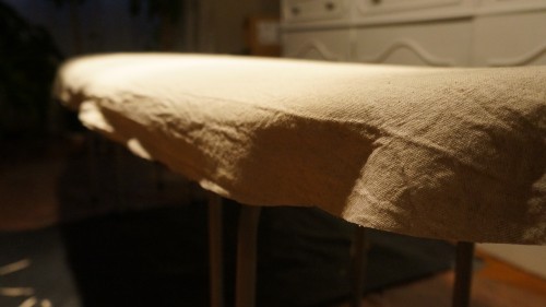 cloth trimmed below the blank