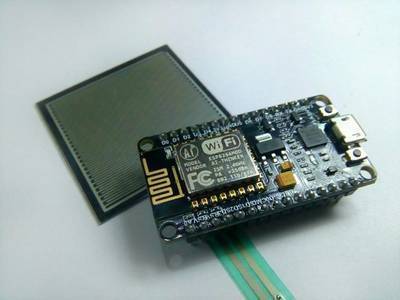 Interface Force Sensitive Resistor to Fade an LED Using NodeMCU