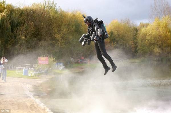 Rocket man blasts into the history books at a world record-breaking 32mph - the fastest ever travelled by a jet suit