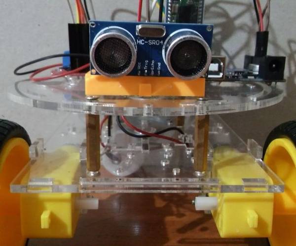 Obstacle Avoiding and Manual Controllable Robot Using Android Phone