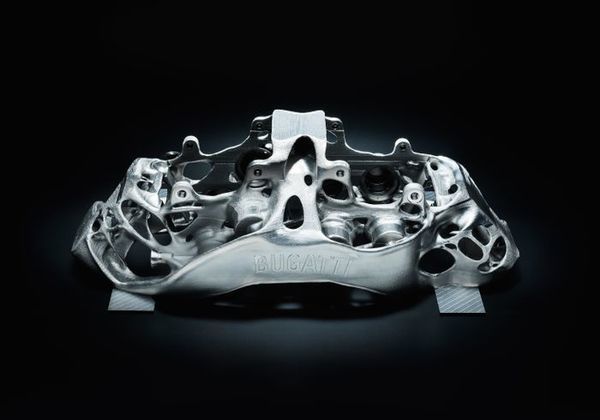 World premiere: brake caliper from 3-D printer - Bugatti develops world’s largest titanium functional component produced by additive manufacturing