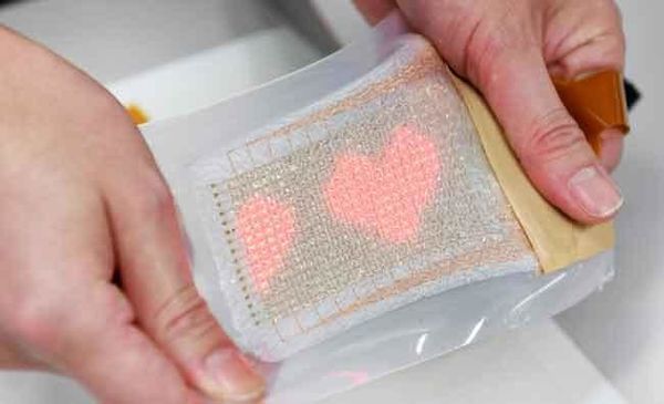 Palmreaders? Japan team builds second skin message display