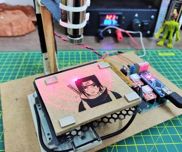 Mini CNC Laser Wood Engraver and Paper Cutter.