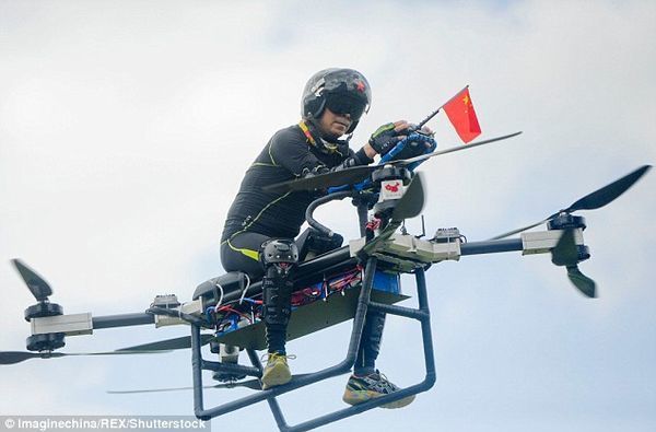It's a 'flying motorbike'! Impressive homemade drone takes off with its Chinese inventor on board