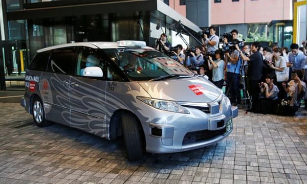 Driverless taxi debuts in Tokyo in 'world first' trial ahead of Olympics