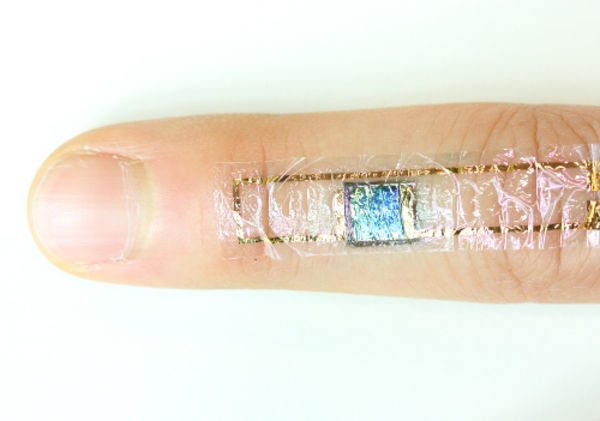 A self-powered heart monitor taped to the skin