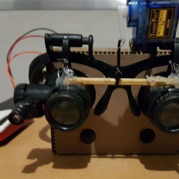 Voice Controlled Glasses and Magnifying Lens