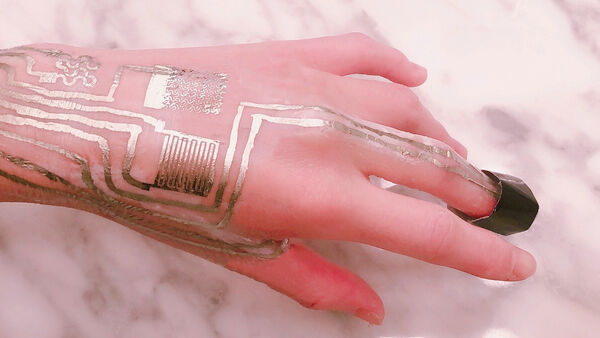 Engineers print wearable sensors directly on skin without heat