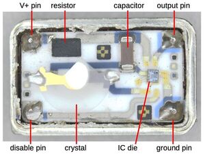 Teardown of a quartz crystal oscillator and the tiny IC inside