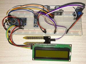 Soil moisture and distance sensor with IR remote control