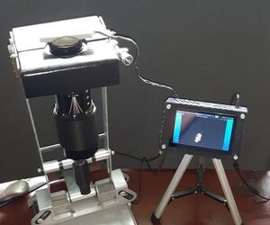 Soldering Microscope From SLR Zoom Lens and TV Wall Mount