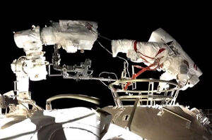 Chinese astronauts install tools on first spacewalk outside new space station