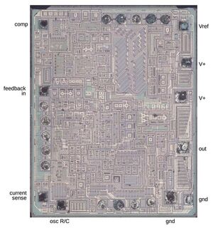 Reverse-engineering a vintage power supply chip from die photos