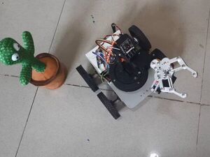 Arduino based WiFi mobile robotic arm with on-board camera